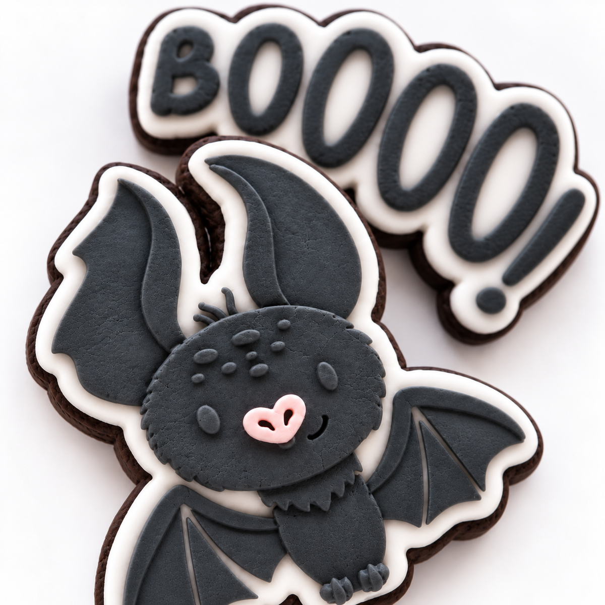 Close-up of the handmade fondant details on the Halloween Bat Trio cookies
