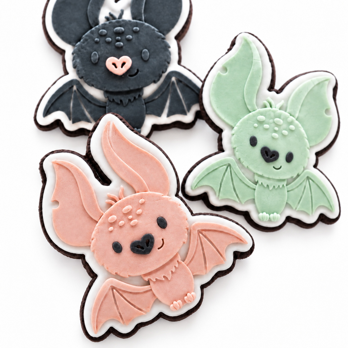 Close-up of the handmade fondant details on the Halloween Bat Trio cookies.