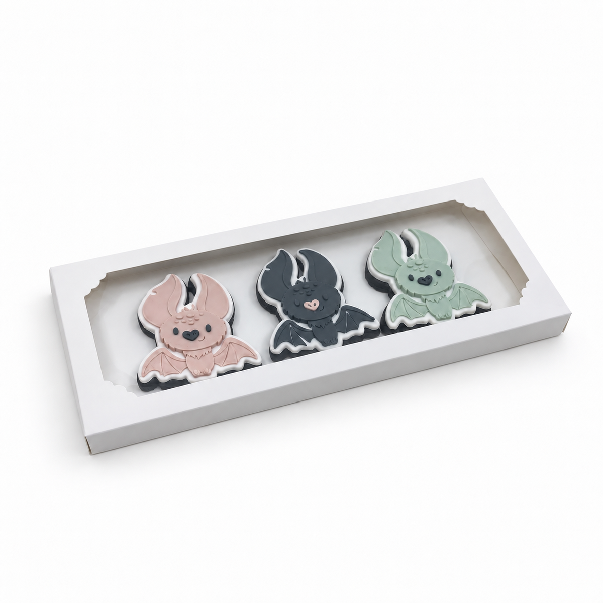 Halloween Bat Trio fondant sugar cookies presented in a white windowed gift box.