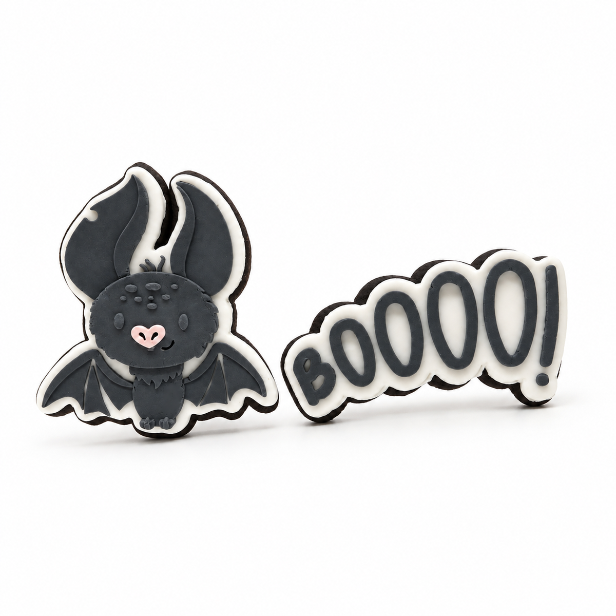 Charcoal bat and BOOOO! Halloween fondant sugar cookies on a white background.