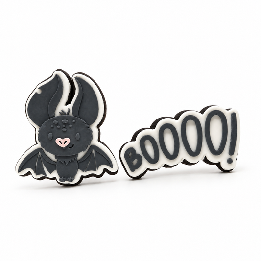 Charcoal bat and BOOOO! Halloween fondant sugar cookies on a white background.